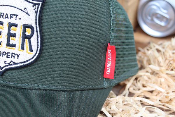 Team trucker cap. Only $14.95 with any purchase